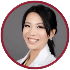 A person smiling for a pictureDescription automatically generated